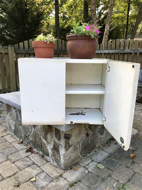 vintage metal cabinet with shelves